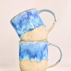 Blue crumpled ceramic mug with handle, gradient floating glaze, stoneware, handmade