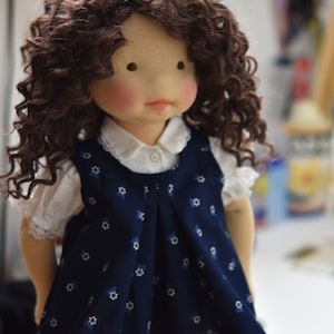 PDF sewing pattern and tutorial for vintage-style doll dress with puff sleeves and floral embroidered collar. Fits 18-20 inch Waldorf dolls. Elegant and classic look.