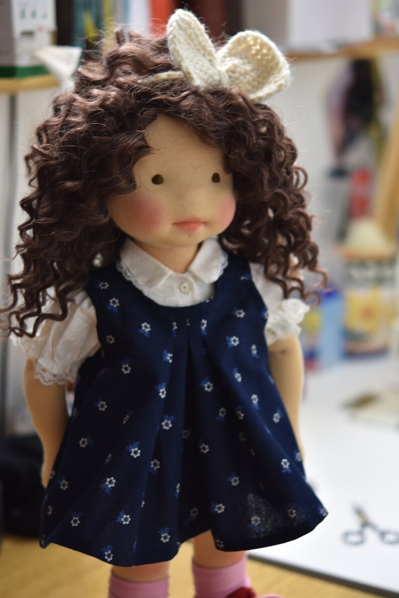 PDF sewing pattern and tutorial for vintage-style doll dress with puff sleeves and floral embroidered collar. Fits 18-20 inch Waldorf dolls. Elegant and classic look.
