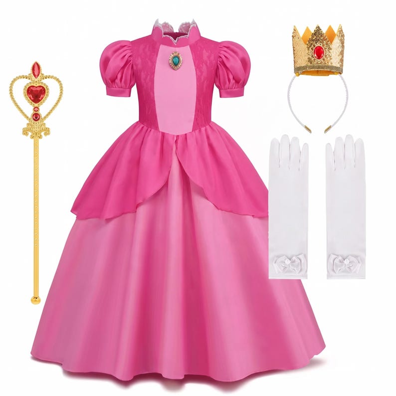 May include: A pink princess costume set, including a long gown, crown, gloves, and a scepter. The dress features a layered skirt and puffed sleeves. The gold crown has red accents, and the scepter has a heart-shaped jewel.