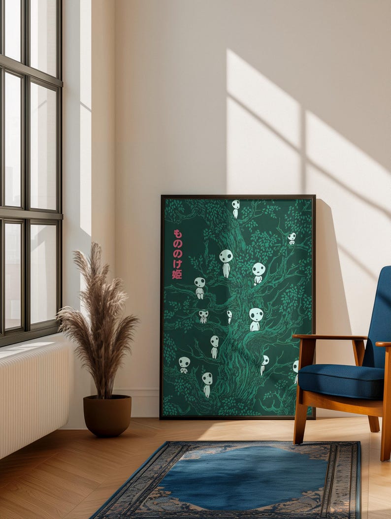 May include: A framed poster featuring a dark green illustration of a tree with numerous white, spirit-like figures. The poster has Japanese text in pink. The scene is set in a room with a blue chair, a rug, and a window.