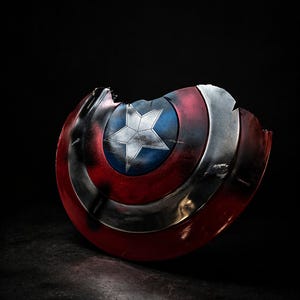 Battle Damaged Captain America Shield Handmade Metal Replica
Endgame Inspired Cosplay Shield for Collectors
Metal Superhero Shield with Leather Straps
Movie Prop Shield Wall Display Decor
Handmade Battle Worn Collector Shield
Premium Cosplay Shield Replica Gift
Metal Shield for Comic Con Cosplay
Superhero Display Shield Home Decor
Battle Scarred Shield Replica Collectible
Custom Handmade Metal Shield Replica

battle damaged shield, captain shield, cosplay shield, metal shield,