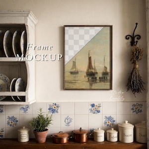 May include: A rectangular wall frame mockup featuring a split design with a transparent grid on the top left and a painting of three sailboats on water on the bottom right. The frame is dark brown and hangs on a wall next to a white wooden shelf.