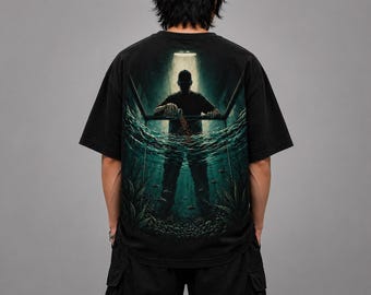 Camiseta gráfica surrealista oscura, camisa urbana extragrande Drowned Feed