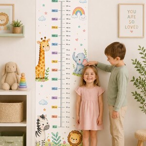 May include: A colorful kids' height growth chart with the text "Kids Height Growth Chart Watch Me Grow!". The chart features illustrations of a giraffe, elephant, zebra, and lion, with measurements in centimeters. Two children are standing in front of the chart.