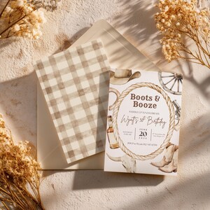 May include: An invitation suite with a western theme. The invitation card features the text "Boots & Booze" and "Wyatt's 30th Birthday" with illustrations of cowboy boots, a hat, and a rope. The envelope and backing card have a tan gingham pattern.