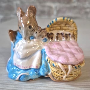 Beatrix Potter Figurine Hunca Munca with Babies in Bassinet