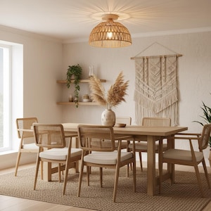 May include: A dome-shaped ceiling light fixture featuring a woven rattan shade in a natural light brown tone, mounted on a circular wooden base, casting a soft glow with distinct light rays emanating from the centre onto the ceiling surface.