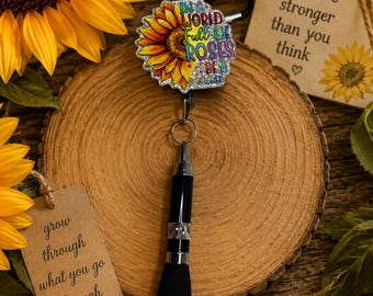 In a World Full of Roses Be The Sunflower