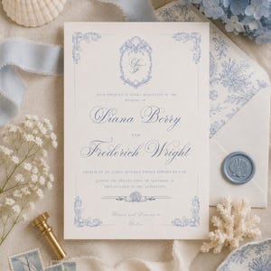 May include: A rectangular wedding invitation card featuring blue ink text and ornate floral border details. The text reads: Your presence is kindly requested at the wedding of Diana Berry and Frederick Wright, Church of St. James, Avonlea, Prince Edward Island, Sunday the twenty-first of November at two o'clock in the afternoon.