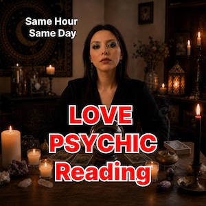 May include: A person in a black top sits behind a wooden table with a crystal ball, tarot cards, and lit candles. The text reads "Same Hour Same Day" and "LOVE PSYCHIC Reading" in bold red letters with white outlines against the dark, moody setting.