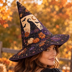 May include: A tall, pointed witch hat featuring a quilted fabric design in shades of black, purple, and orange. The hat is decorated with patterns of pumpkins, flowers, crescent moons, and bats, with a central graphic of a smaller witch hat.