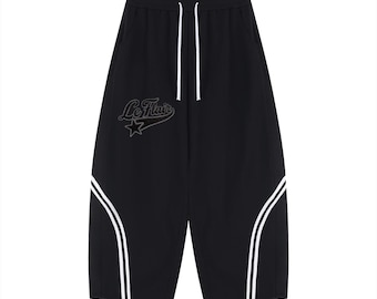 Uniseksowe spodnie dresowe z szerokimi nogawkami i lamówką