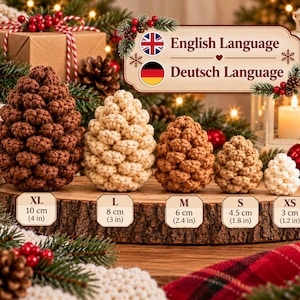 May include: Five crocheted pinecones in varying sizes from XL to XS, ranging from 10 cm (4 in) to 3 cm (1.2 in). The pinecones are colored in shades of dark brown, cream, light brown, and tan, arranged in a row on a wooden slice.
