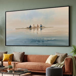 May include: A large rectangular wall art print featuring an oil painting of four individuals rowing a long boat across a calm, misty body of water. The scene uses a soft palette of muted blues, creams, and whites with visible brushstrokes.