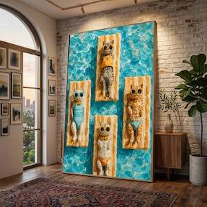 May include: Large framed artwork depicting five cats relaxing on beach towels in a pool. The cats are wearing sunglasses and swimwear. The background is a textured blue water design. The artwork is displayed in a room with a brick wall and a large window.