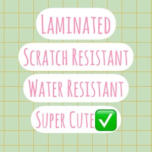 May include: Four white rounded rectangular labels with pink text on a light green grid background. The text reads LAMINATED, SCRATCH RESISTANT, WATER RESISTANT, and SUPER CUTE with a green square icon containing a white checkmark.