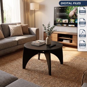 May include: A black circular coffee table with curved legs, featuring a vase with eucalyptus branches and a stack of books on top. A vertical sidebar displays the text DIGITAL FILES with icons for SVG, DXF, PDF, and STEP file formats.