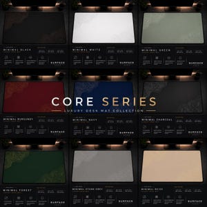 May include: A collection of nine rectangular desk mats from the Core Series, each featuring a topographic line pattern in the corner. The mats are available in black, white, green, burgundy, navy, charcoal, forest, stone grey, and beige colours.