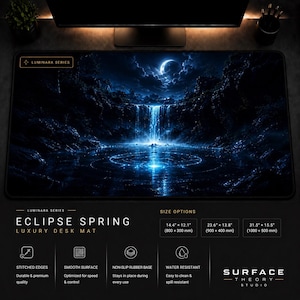 May include: A rectangular desk mat featuring a dark blue night scene with a glowing waterfall, crescent moon, and rippling water. Text includes LUMINARA SERIES, ECLIPSE SPRING, and size options ranging from 36.6 x 30.7 cm to 80 x 38.1 cm equivalent.