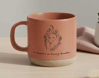 A Heart is a Heavy Burden Coffee Mug