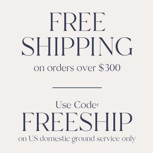 a promotional message for a free shipping offer on orders over $300. It states that the offer applies to US domestic ground service only. The text is in a large font and is centrally positioned in the image.