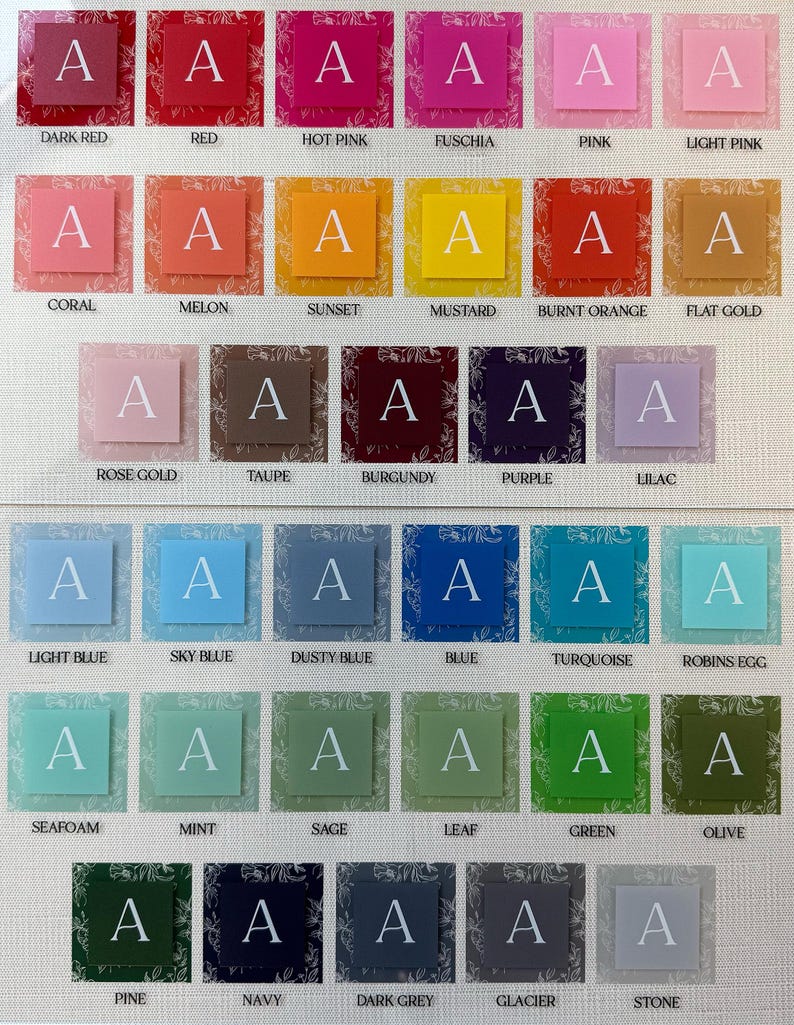 May include: A color chart featuring a variety of shades, each with a square background and a white letter "A". Colors range from dark red to stone, including pinks, blues, greens, and yellows. Each square has a floral pattern.
