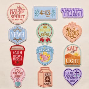 May include: A collection of twelve embroidered patches featuring religious themes, including text such as 'May the Holy Spirit be with you', 'Phil 4:13', 'Jesus is King', 'Faith brews miracles', 'Revival is here', 'Salt and Light', 'You are the light', and 'Jesus saves'.