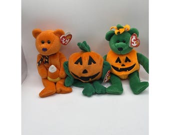 Lote de 3 peluches Ty Beanie Babies de Halloween: Treater, Tricky y Pumpkin.