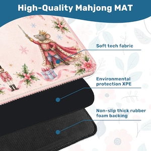 May include: A high-quality Mahjong mat with a whimsical design featuring a mouse king in a red and gold coat. The mat has a soft tech fabric surface, environmental protection XPE, and a non-slip thick rubber foam backing. The text "High-Quality Mahjong MAT" is at the top.