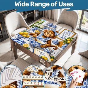 May include: A wooden table with a decorative top featuring a monkey in a blue and white apron, surrounded by lemons and teacups. The table has a blue and white checkered border. The text "Wide Range of Uses" is at the top.