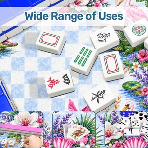 May include: White Mahjong tiles with red, green, and black symbols and designs are scattered on a blue and white checkered surface. The text "Wide Range of Uses" is at the top of the image. The image also shows dominoes and playing cards.