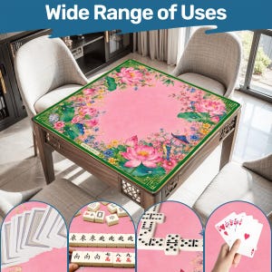 May include: A wooden table with a pink surface, adorned with a floral design featuring lotus flowers and other blooms. The table is surrounded by chairs and showcases various games like cards, mahjong, and dominoes. The text "Wide Range of Uses" is at the top.
