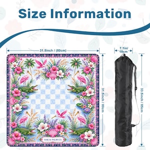 May include: A square, floral-themed mat with a blue and white checkered center, surrounded by pink flowers, flamingos, and alligators. The mat is 31.5 inches (80cm) square and comes with a black carrying bag. The text "Size Information" is at the top.