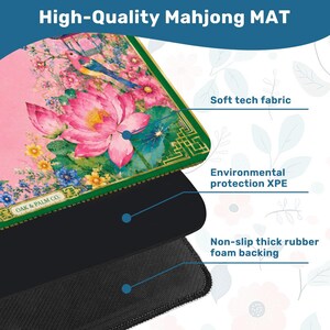 May include: A pink Mahjong mat with a floral design featuring a large lotus flower and a bird. The mat has a green border and the text "High-Quality Mahjong MAT". It has a soft tech fabric, environmental protection XPE, and a non-slip rubber foam backing.