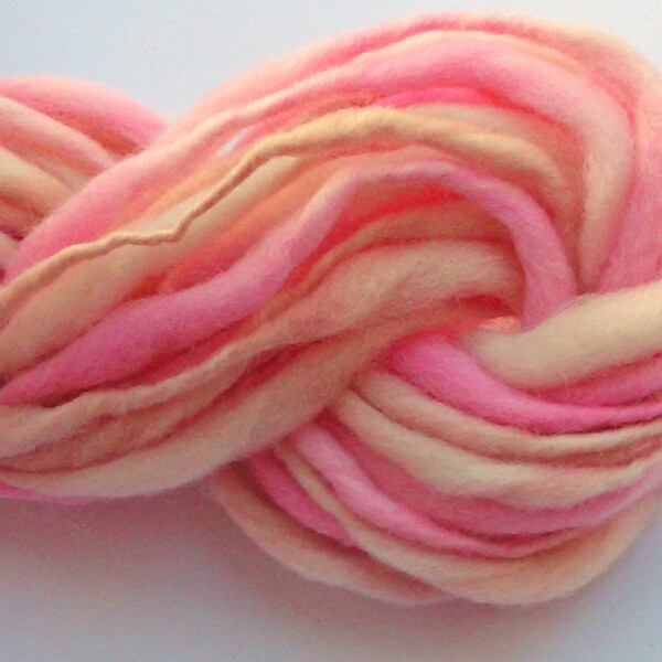 Strawberry malt   - Hand spun yarn, hand dyed slub. Thick and thin. Pure Australian 21 micron merino wool.