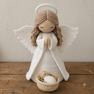 Schema per realizzare all'uncinetto un presepe angelo custode, angelo di Natale amigurumi con mangiatoia (download in PDF)