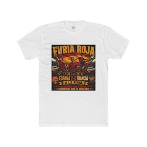 May include: A white short-sleeve t-shirt featuring a graphic print of soccer players in red jerseys. The text reads FURIA ROJA, ESPAÑA 2-0 FRANCIA, A LA FINAL, GANAMOS CON PASION, CANTAMOS CON EL CORAZON, VAMOS ESPAÑA, DALE CAMPEON, and VICTORIA TOTAL.