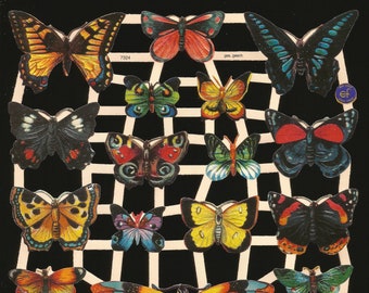 May include: A sheet of colourful butterfly stickers with a white grid background. The butterflies are in various colours, including red, blue, green, yellow, orange, and black. The text "Scraps A-Plenty" is printed at the bottom of the sheet.
