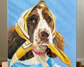 A handmade acrylic oil painting of a Springer Spaniel wearing a headscarf and necklace: private commissions accepted.