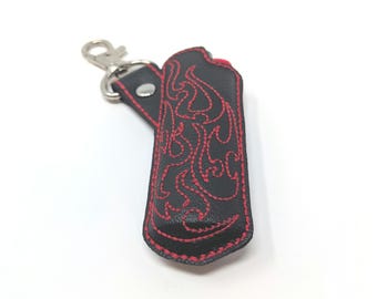 Lighter holder with Red flames embroidered on the front of it. Red flame lighters embroidered lighter holder