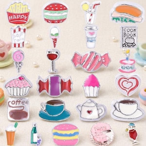 May include: A selection of colourful enamel charms featuring food and drink designs. The charms include a burger, ice cream cone, cupcake, coffee cup, and a wine glass. Some charms have the words "HAPPY" and "coffee" on them.