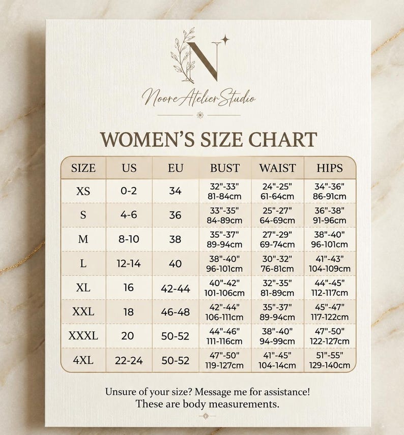 May include: A size chart for clothing featuring the Noore Atelier Studio logo at the top. The chart lists sizes from XS to 4XL with corresponding US and EU sizes, and body measurements for bust, waist, and hips in inches. Text at the bottom reads: Unsure of your size? Message me for assistance! These are body measurements.