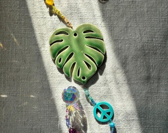 Peace Monstera Sun Catcher, North Carolina Pottery by Dawn Tagawa, Crystal Prism Rainbow Maker