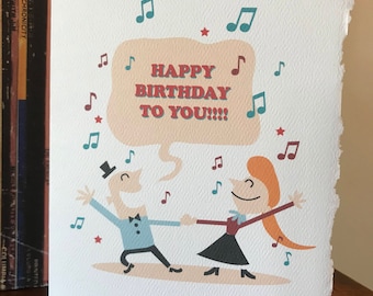 Compleanno danzante, compleanno cantato [biglietto di auguri / musical]