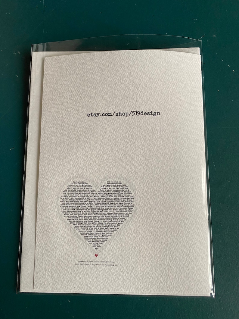 May include: A white card with a heart-shaped design made of text. The text is a poem about friendship. The card has the text "etsy.com/shop/519design" at the top.