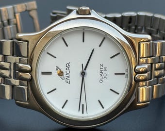 Vintage Enicar Quarzuhr Ref 902.189B Weißes Zifferblatt Stahlgehäuse S-59