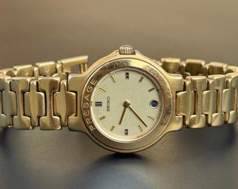 Vintage 1987 SEIKO PRESAGE 3E29-0050. Mit Datum vergoldet Quartz Damen S-44