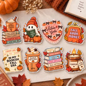 May include: A set of eight decorative acrylic stickers featuring autumn-themed illustrations including a mug of cocoa on books, a ghost reading, a heart-shaped cake, a pumpkin purse, a library card, a latte, a stack of books, and a candle.