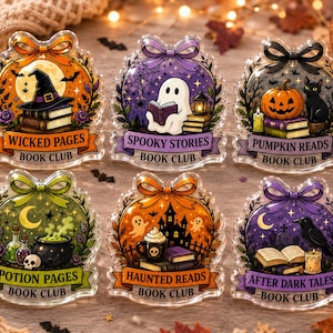 May include: Six decorative acrylic ornaments featuring Halloween-themed illustrations and bows. Each ornament displays a unique scene with books, ghosts, pumpkins, or cauldrons, and includes text such as Wicked Pages, Spooky Stories, Pumpkin Reads, Potion Pages, Haunted Reads, and After Dark Tales Book Club.